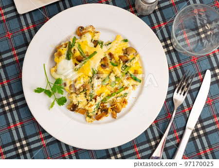Popular breakfast of Spanish cuisine is Revuelto Popular breakfast of Spanish cuisine is Revuelto 97170025