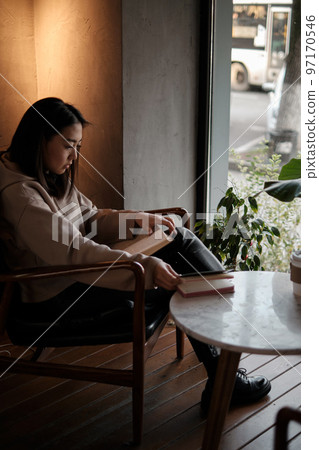 asian female student performs homework asian female student performs homework 97170546