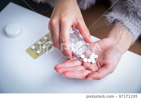 A woman's hand medicine A woman's hand medicine 97171295