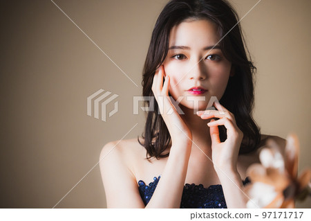 A woman in a navy dress 97171717