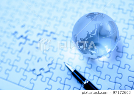 Globe on jigsaw puzzle last piece blue 97172603