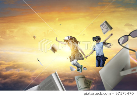 Kids wearing virtual reality goggles 97173470