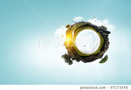 Green sphere landscape with grass and clear water 97173548
