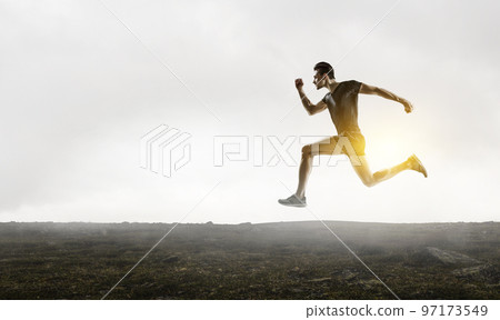 Man in sportwear running . Mixed media Man in sportwear running . Mixed media 97173549
