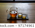 Oriental beauty tea in a transparent glass 97174961