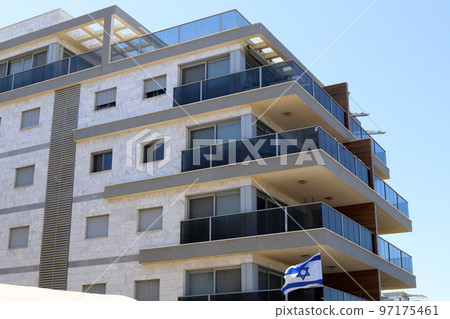 Balcony - a platform with railings protruding on the upper floors of the building. Balcony - a platform with railings protruding on the upper floors of the building. 97175461