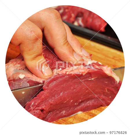 Clean very fresh red raw cow meat and a sharp knife Clean very fresh red raw cow meat and a sharp knife 97176826