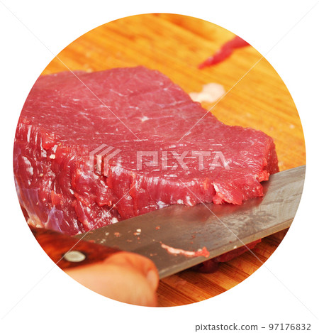 Clean very fresh red raw cow meat and a sharp knife 97176832