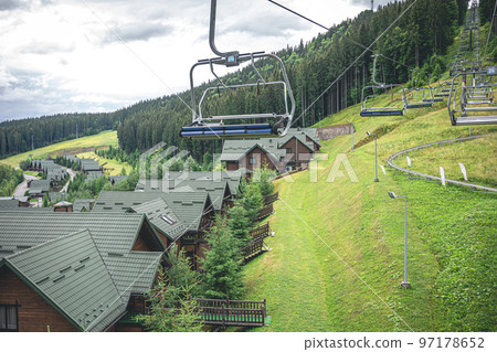 Funicular in the mountains in the resort town. 97178652
