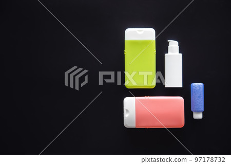 Flat lay spa composition with skin care products on black background. 97178732