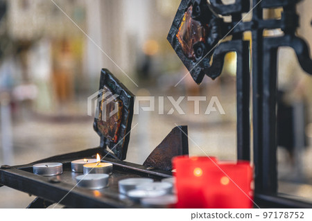 Lots of small candles in a catholic church. Lots of small candles in a catholic church. 97178752