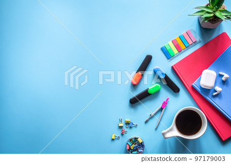 School supplies stationery on a blue background, copy space. School supplies stationery on a blue background, copy space. 97179003