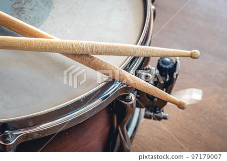 Close-up, drumsticks on a blurred background. 97179007