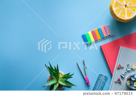 School supplies stationery on a blue background, copy space. School supplies stationery on a blue background, copy space. 97179015