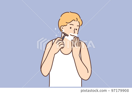 Smiling man shaving with razor 97179908