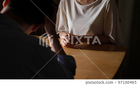 A couple discussing divorce (adultery / marital quarrel) 97180465