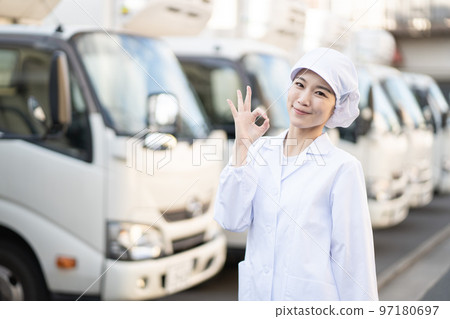 Young female food delivery driver (OK pose) Young female food delivery driver (OK pose) 97180697