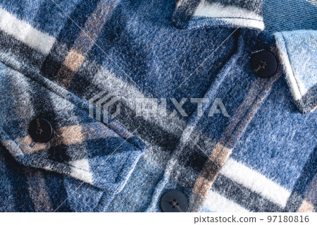 Close-up, autumn warm textural blue plaid shirt. Close-up, autumn warm textural blue plaid shirt. 97180816
