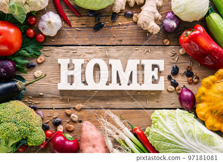 Flat lay composition with decorative word home and vegetables. Flat lay composition with decorative word home and vegetables. 97181081