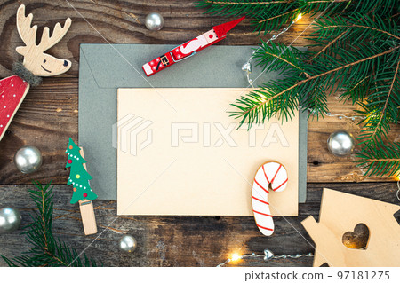 Blank paper, envelope and Christmas decor on wooden background, copy space. Blank paper, envelope and Christmas decor on wooden background, copy space. 97181275
