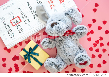 Valentine's Day background, date February 14 on calendar, flat lay, top view. 97181294