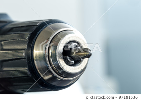 Electric drill close-up in a repair shop. 97181530