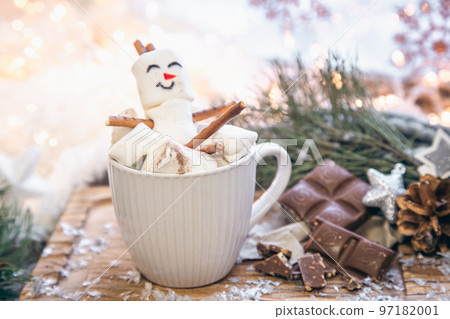 Christmas background with marshmallow snowman in a cup. Christmas background with marshmallow snowman in a cup. 97182001
