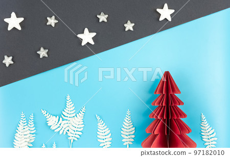 Christmas background with origami paper tree on paper background, flat lay. Christmas background with origami paper tree on paper background, flat lay. 97182010