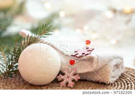 Winter spa composition with body care items and decor details. Winter spa composition with body care items and decor details. 97182200