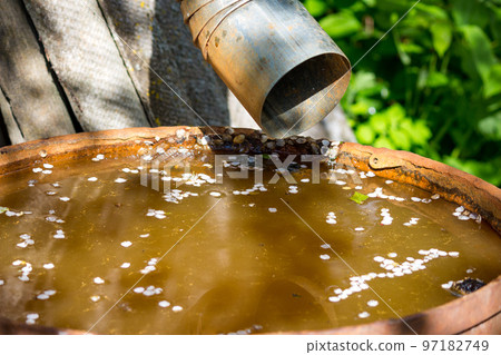 Rusty Barrel for Rainwater in the Countryside 97182749