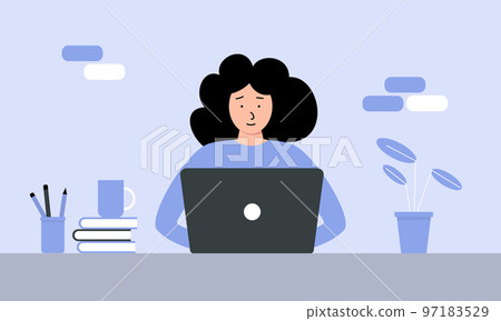 A young woman is sitting at a table and using a laptop. Home office concept 97183529