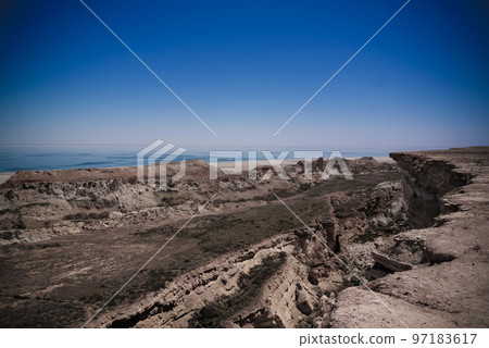 Panorama view to Aral sea from the rim of Plateau Ustyurt near Duana cape , Karakalpakstan, Uzbekistan Panorama view to Aral sea from the rim of Plateau Ustyurt near Duana cape , Karakalpakstan, Uzbekistan 97183617