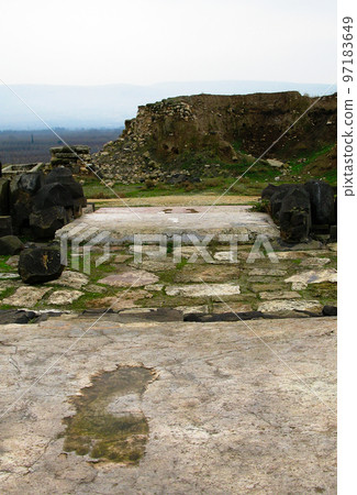 Giant footprints of the Ishtar goddess steps in the Ain Dara temple near Aleppo, Syria 97183649