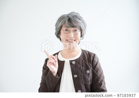 Senior woman pointing Senior woman pointing 97183937