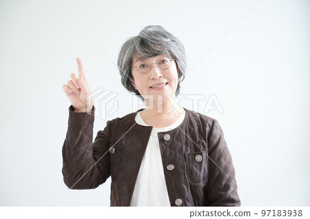 Senior woman pointing Senior woman pointing 97183938