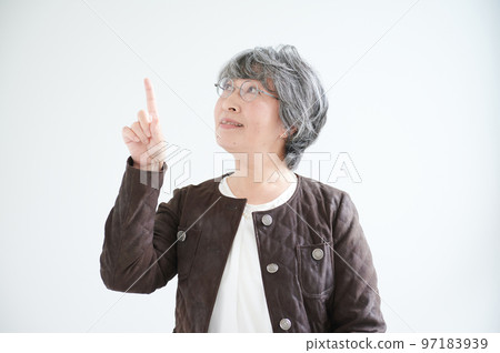 Senior woman pointing Senior woman pointing 97183939