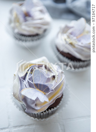 Cupcakes with butterfly decorations 97184717