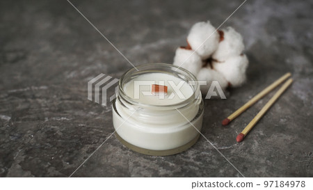 Label mockup of the glass jar with handmade candle with a wooden wick 97184978