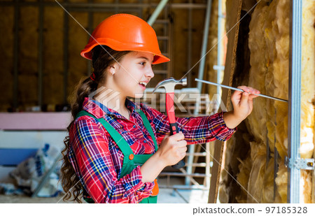 happy kid engineer with hammer tool in hard hat, engineering happy kid engineer with hammer tool in hard hat, engineering 97185328