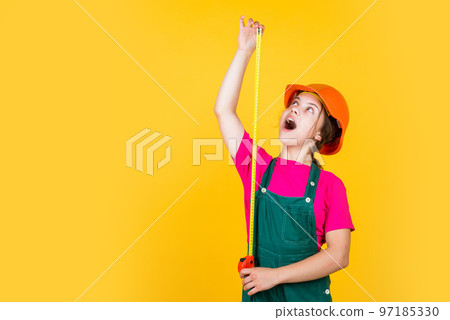 I think I can help you. little girl with measuring tape. instruments for renovation apartment. childhood happiness and development. measuring height. architect. playing with tools. growing concept I think I can help you. little girl with measuring tape. instruments for renovation apartment. childhood happiness and development. measuring height. architect. playing with tools. growing concept 97185330