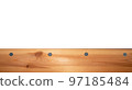 Top view light wood texture surface with natural pattern and metal nail heads or hats. Wooden pine board isolated on white. Spruce table with knots. Rustic craft. Workbench. Box edge. 97185484