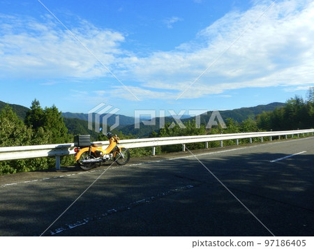 Walking around the mountains on a cross-cab, nice weather Walking around the mountains on a cross-cab, nice weather 97186405