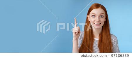 Girl made excellent suggestion think up great idea raising index finger eureka got it gesture smiling thrilled wanna share plan team speaking look camera excitement joy, standing blue background Girl made excellent suggestion think up great idea raising index finger eureka got it gesture smiling thrilled wanna share plan team speaking look camera excitement joy, standing blue background 97186889