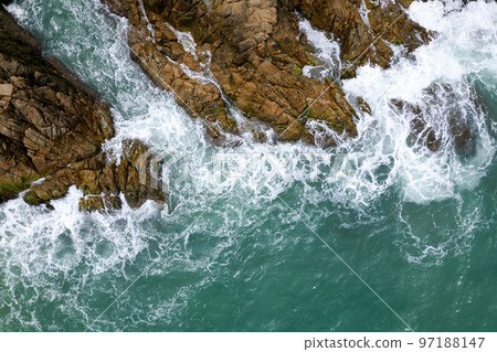 Aerial view of Amazing seashore at Phuket Thailand beautiful wave crashing on seacoast, Top view sea in summer season,Beautiful sea surface background 97188147