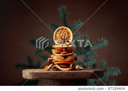 Christmas still-life with dried fruits and nuts. Christmas still-life with dried fruits and nuts. 97189404