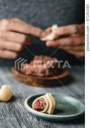 filling Catalan galets pasta with ground meat filling Catalan galets pasta with ground meat 97191085