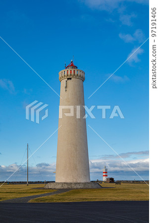 Lighthouse on the coast of Icelandic sea, Iceland Lighthouse on the coast of Icelandic sea, Iceland 97191406