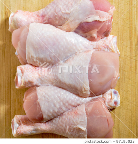 Fresh uncooked chicken meat drumsticks pieces, baget ready to cook 97193022