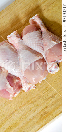 Fresh uncooked chicken meat drumsticks pieces, baget ready to cook 97193717