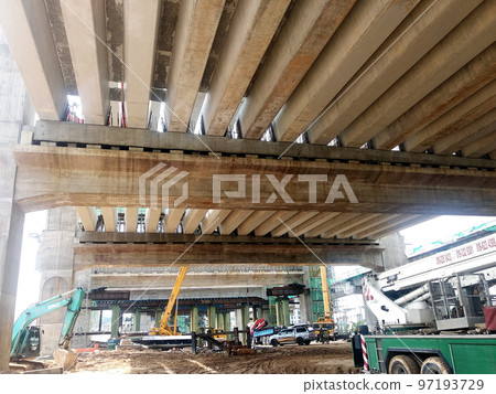 SELANGOR, MALAYSIA -JULY 6, 2022: An elevated road is under construction. Reinforced concrete is used for the structure. Construction is done in stages according to the sequence of works. SELANGOR, MALAYSIA -JULY 6, 2022: An elevated road is under construction. Reinforced concrete is used for the structure. Construction is done in stages according to the sequence of works. 97193729